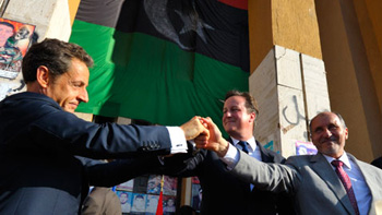 Libya receives Sarkozy and Cameron